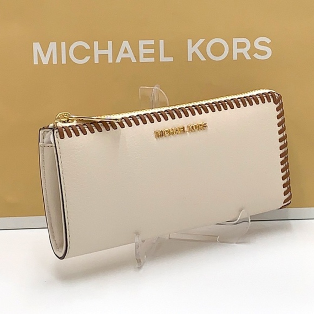 MICHAEL KORS JET SET TRAVEL LARGE THREE QUARTER ZIP WALLET LIGHT CREAM MULTI